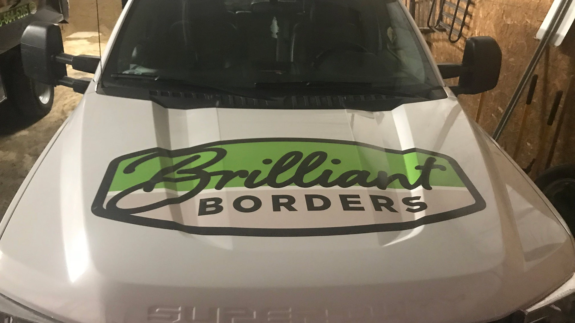 Branded hood on work truck in Clive, IA.