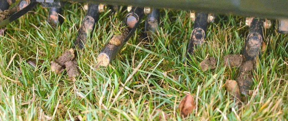 Aerator machine on a lawn in Waukee, IA.