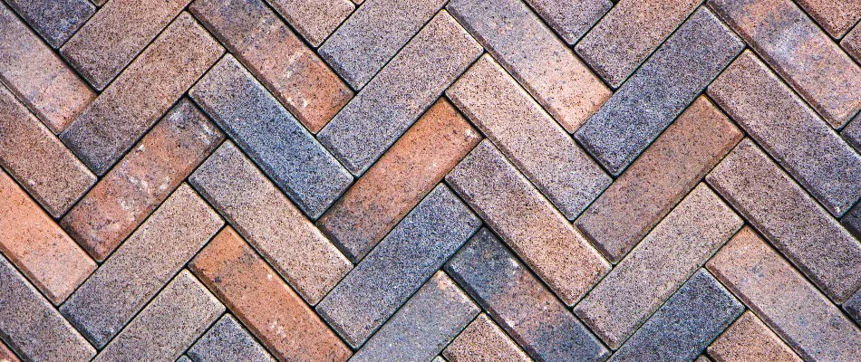 Herringbone paver pattern on a patio in Waukee, IA.