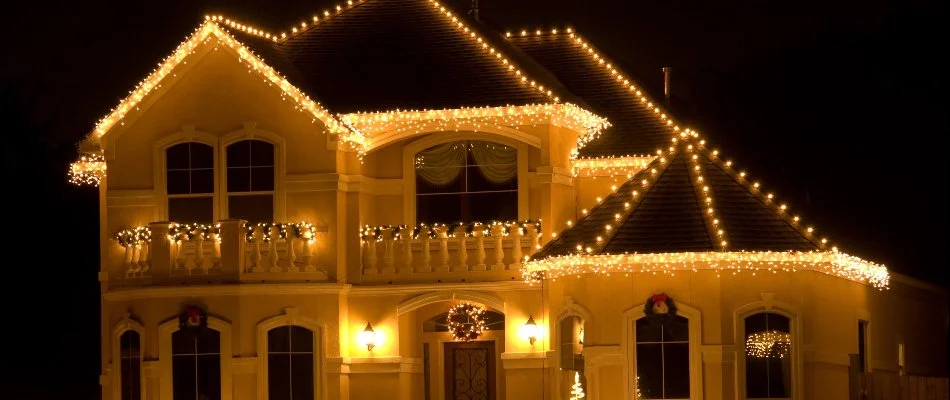 House in Waukee, IA, with a holiday lighting display.