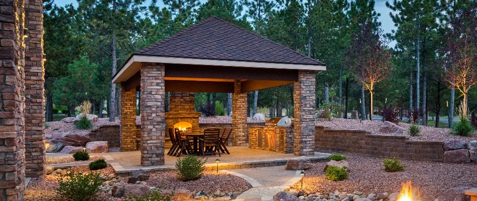 Retaining wall around an outdoor fireplace in Waukee, IA.