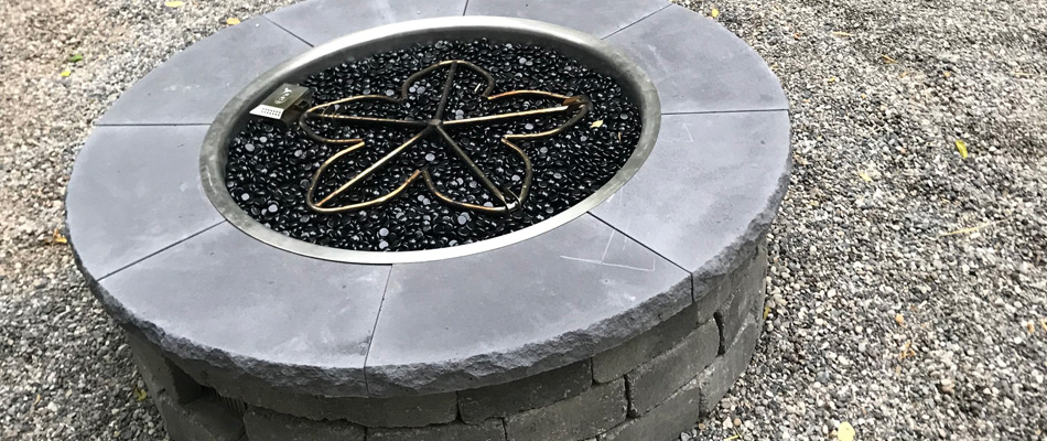 A gas fired fire pit installed for a property in Urbandale, IA.