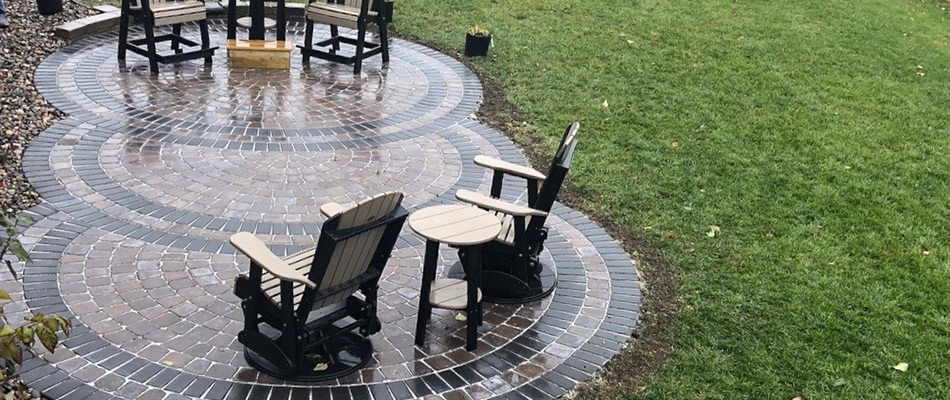 Patio installed with furniture placed on top in West Des Moines, IA.