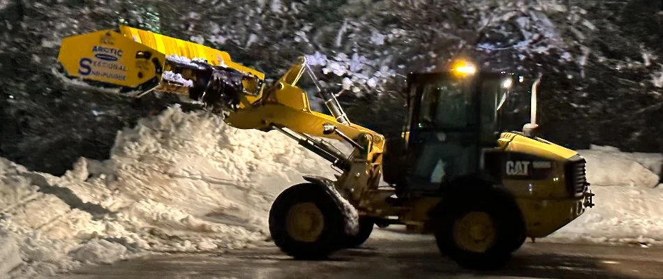 Snow removal in the winter in Andrew, IA.